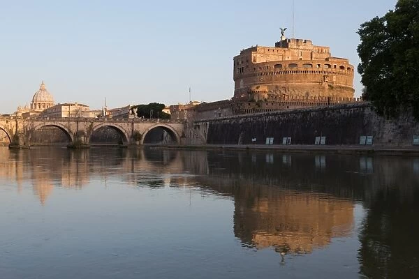 The River Tiber with Castel Sant Angelo, Ponte Sant Angelo bridge and the dome of St. Peters Basilica, Rome, Lazio, Italy, Europe