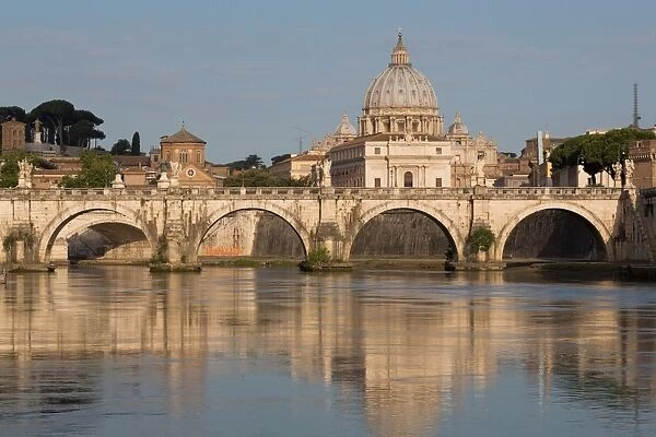 The River Tiber with Ponte Sant Angelo bridge and St. Peters Basilica, Rome, Lazio, Italy, Europe