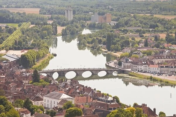 The River Yonne flowing through the town of Joigny, Yonne, Burgundy, France, Europe