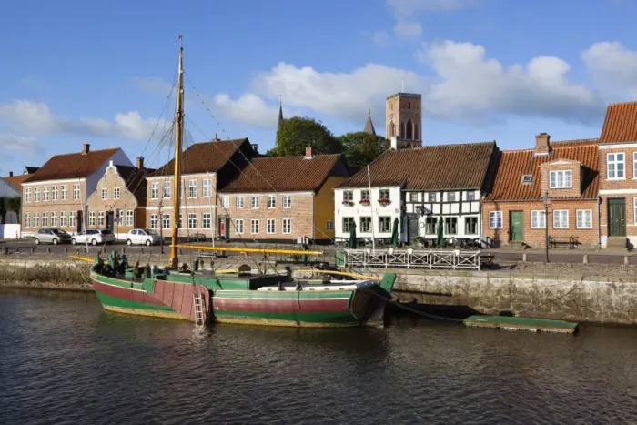 Framed Print : Riverfront houses and tower of Ribe Domkirke, Ribe, Jutland, Denmark, Scandinavia, Europe Framed Print : Riverfront houses and tower of Ribe Domkirke, Ribe, Jutland, Denmark, Scandinavia, Europe