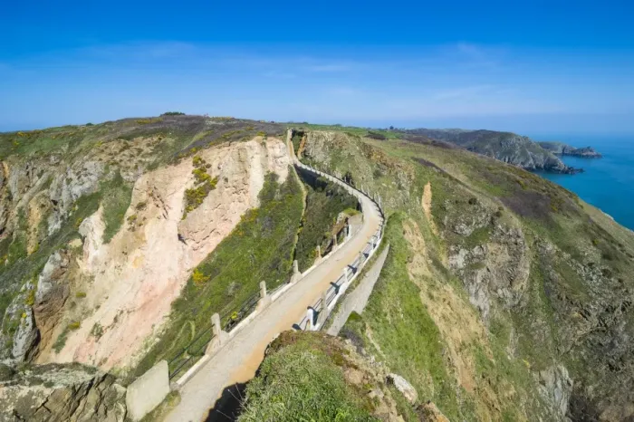 Framed Print : Road connecting the narrow isthmus of Greater and Little Sark, Channel Islands, United Kingdom Framed Print : Road connecting the narrow isthmus of Greater and Little Sark, Channel Islands, United Kingdom