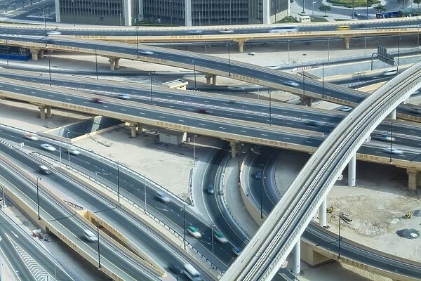 Road interchange and Metro train, Dubai, United Arab Emirates, Middle East