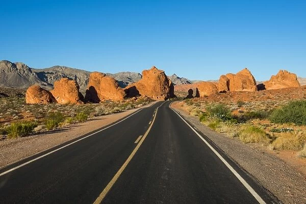 Road leading in the redrock sandstone formations of the Valley of Fire State Park, Nevada, United States of America, North America