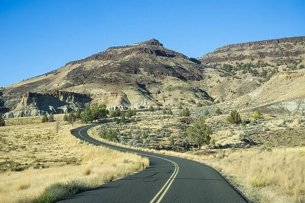 Road leading through the Sheep Rock unit in the John Day Fossil Beds National Monument, Oregon, United States of America, North America