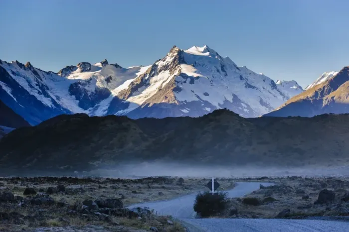 Framed Print : Road in Mount Cook National Park with illuminated mountains in the background, UNESCO World Heritage Site, South Island, New Zealand, Pacific Framed Print : Road in Mount Cook National Park with illuminated mountains in the background, UNESCO World Heritage Site, South Island, New Zealand, Pacific