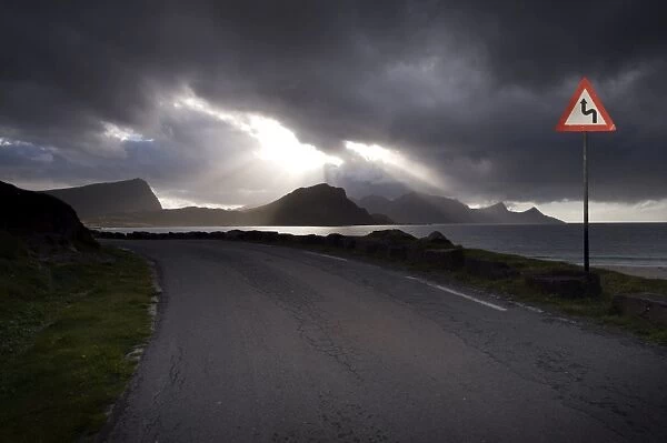 Empty road running alongside fjord, Norway, Scandinavia, Europe