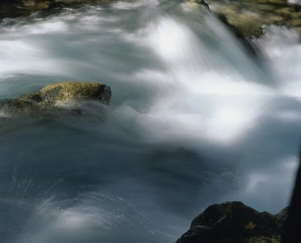 Rock and flowing water in the Marian River
