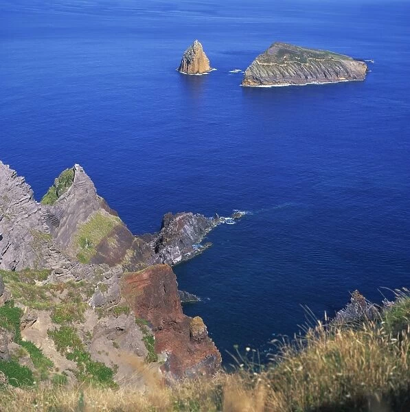 Rock formations on the volcanic coastline on the island