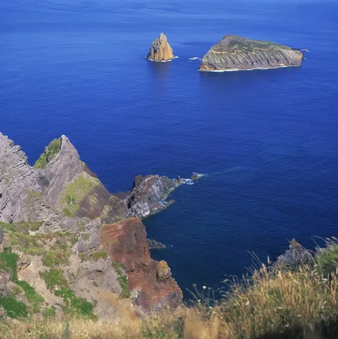 Framed Print : Rock formations on the volcanic coastline on the island Framed Print : Rock formations on the volcanic coastline on the island