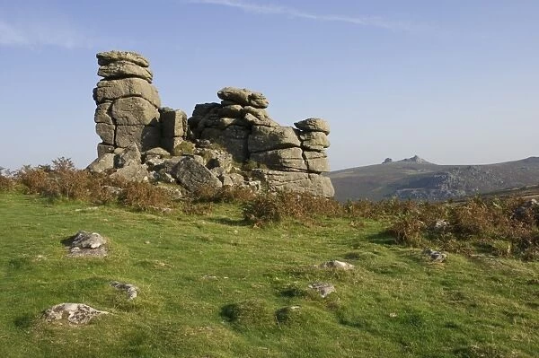A rock outcrop on Hound Tor with Haytor Rocks on the skyline, Dartmoor National Park