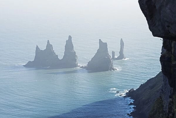 Rock stacks off the coast at Reynisdrangar, Vik, Southern Region, Iceland, Polar Regions