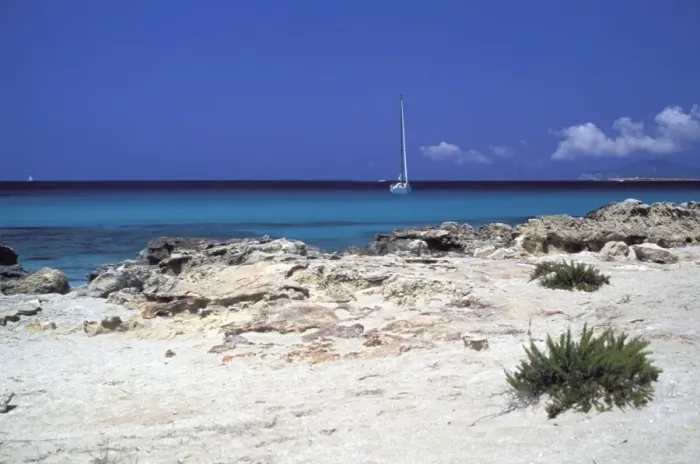 Framed Print : Rocks and sailing boat, Formentera, Balearic Islands, Spain, Mediterranean, Europe Framed Print : Rocks and sailing boat, Formentera, Balearic Islands, Spain, Mediterranean, Europe