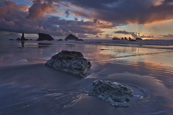 Rocks, sea stacks, and clouds at sunset, Bandon Beach, Oregon, United States of America, North America