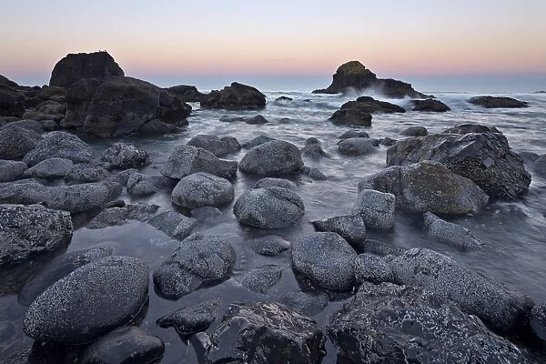 Rocks and sea stacks in the surf at dawn, Ecola State Park, Oregon, United States of America, North America