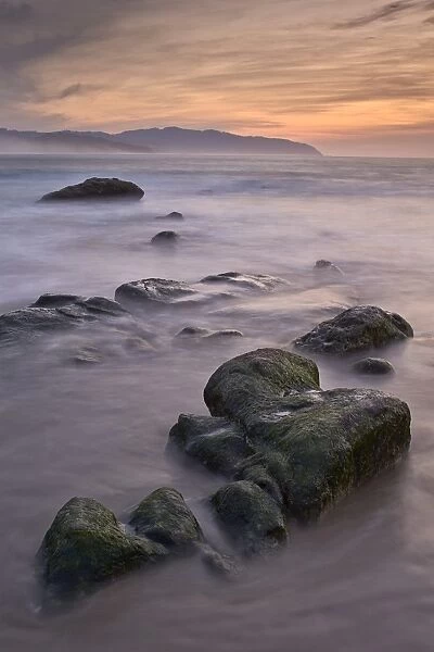 Rocks at sunset, Pacific City, Oregon, United States of America, North America