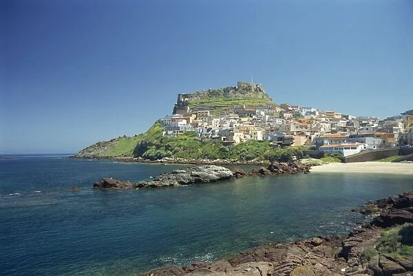 Rocky coast and the houses and fort of Castelsardo