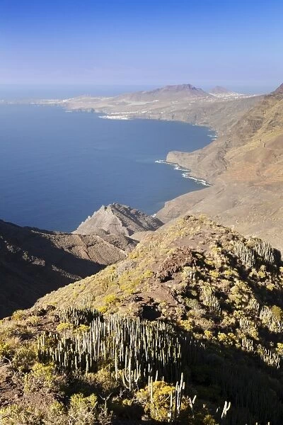 Rocky coastline, Anden Verde, West Coast with Puerto de las Nieves and Faneque Mountain, Tamadapa Natural Park, Gran Canaria, Canary Islands, Spain, Atlantic, Europe