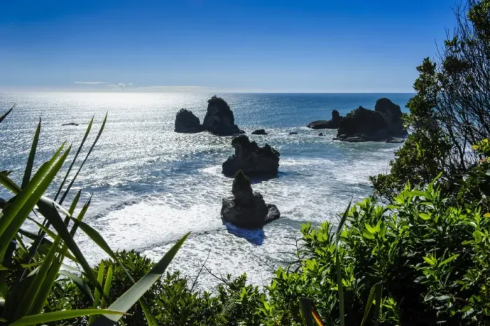 Framed Print : Rocky outcrops in the ocean along the road between Greymouth and Westport, West Coast, South Island, New Zealand, Pacific Framed Print : Rocky outcrops in the ocean along the road between Greymouth and Westport, West Coast, South Island, New Zealand, Pacific