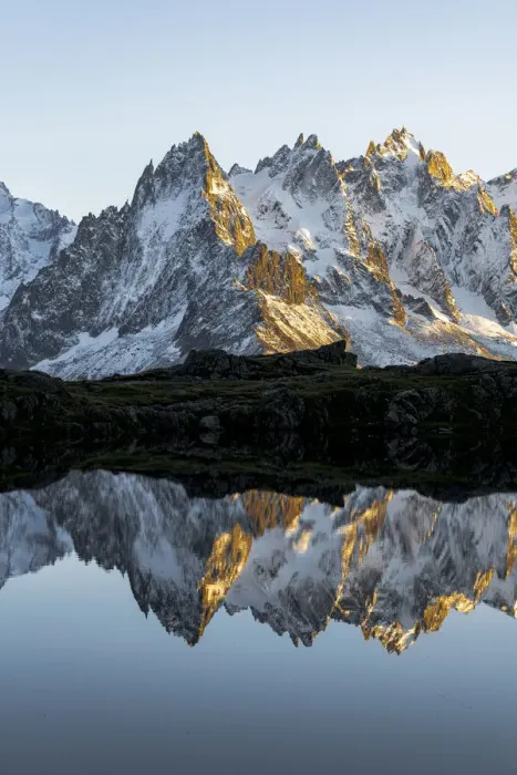 Framed Print : Rocky peaks of Aiguilles de Chamonix reflected in Lacs des Cheserys at sunset Framed Print : Rocky peaks of Aiguilles de Chamonix reflected in Lacs des Cheserys at sunset