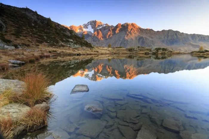 Framed Print : Rocky peaks of Mount Disgrazia reflected in Lake Zana at sunrise, Malenco Valley Framed Print : Rocky peaks of Mount Disgrazia reflected in Lake Zana at sunrise, Malenco Valley