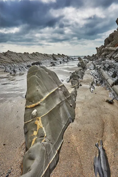 Framed Print : A rocky shore at low tide and under grey skies; at Welcombe Mouth, Hartland, north Devon, England, United Kingdom, Europe Framed Print : A rocky shore at low tide and under grey skies; at Welcombe Mouth, Hartland, north Devon, England, United Kingdom, Europe