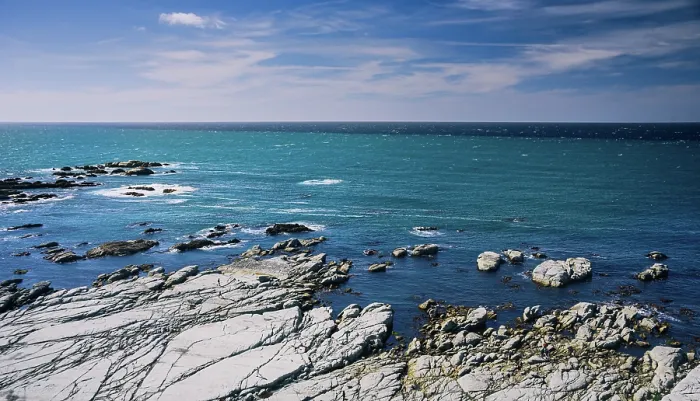 Framed Print : Rocky Shoreline and Vibrant Blue Ocean Waters Stretching Into the Horizon at Kaikoura Peninsula, New Zealand Framed Print : Rocky Shoreline and Vibrant Blue Ocean Waters Stretching Into the Horizon at Kaikoura Peninsula, New Zealand