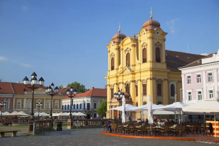 Framed Print : Roman Catholic Cathedral and outdoor cafes in Piata Unirii, Timisoara, Banat, Romania, Europe Framed Print : Roman Catholic Cathedral and outdoor cafes in Piata Unirii, Timisoara, Banat, Romania, Europe