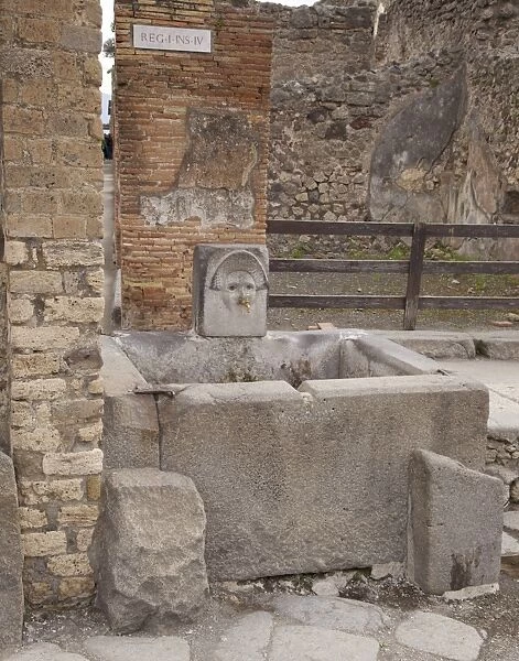 Roman drinking fountain on Via Stabiana, Pompeii, UNESCO World Heritage Site