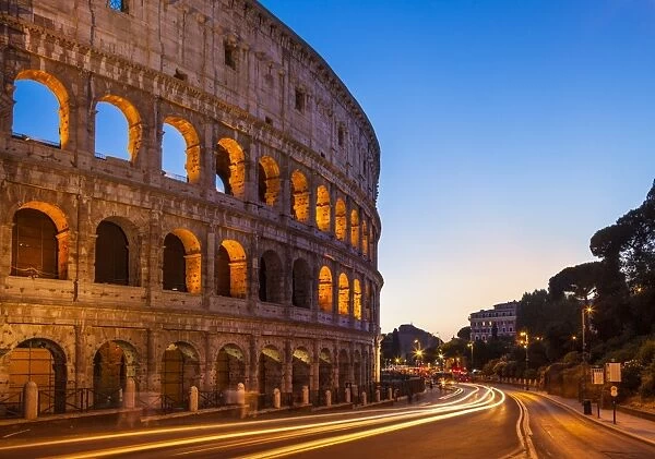 Rome Colosseum (Flavian Amphitheatre) at night with light trail, UNESCO World Heritage Site
