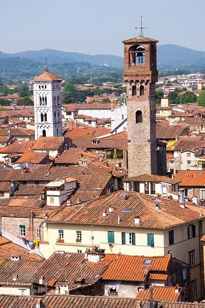 Roofscape as seen from Torre Guinigi, with the Torre delle Ore on the right, Lucca, Tuscany, Italy, Europe