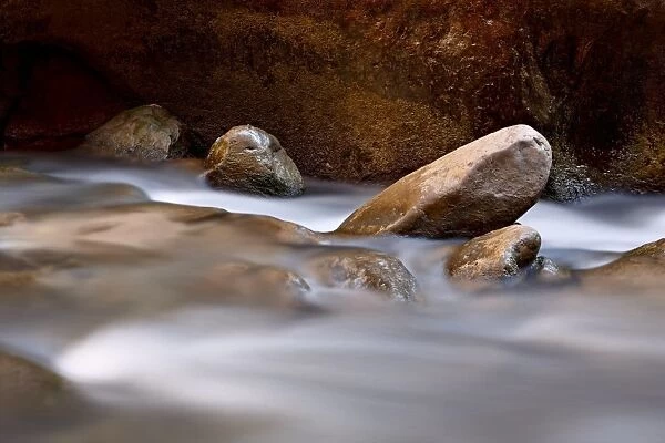 Round rocks in the Virgin River near The Narrows, Zion National Park, Utah