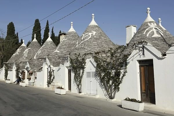 Row of 18th century trulli houses in the Rione Monte district, UNESCO World Heritage Site