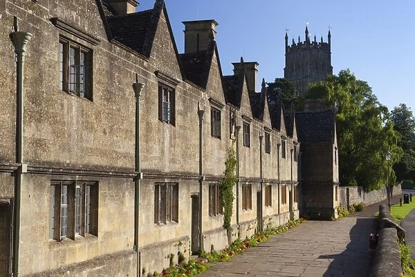 Row of Alms houses and St. James Cotswold wool church, Chipping Campden, Gloucestershire, Cotswolds, England, United Kingdom, Europe