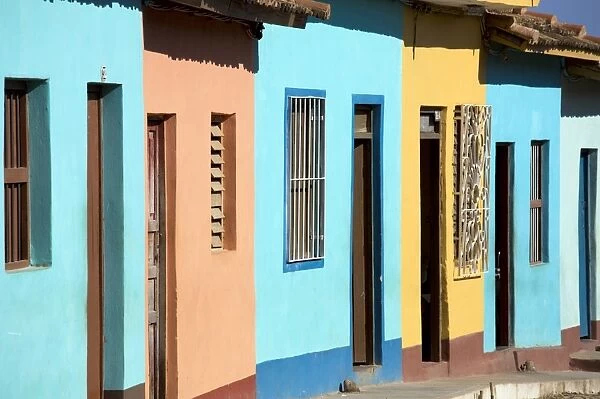 Row of colonial houses painted bright colours, Trinidad, UNESCO World Heritage Site, Cuba, West Indies, Central America