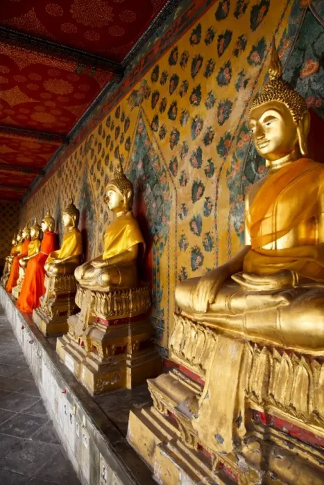 Framed Print : A row of golden seated Buddha statues located inside Wat Arun (The Temple of the Dawn) Framed Print : A row of golden seated Buddha statues located inside Wat Arun (The Temple of the Dawn)