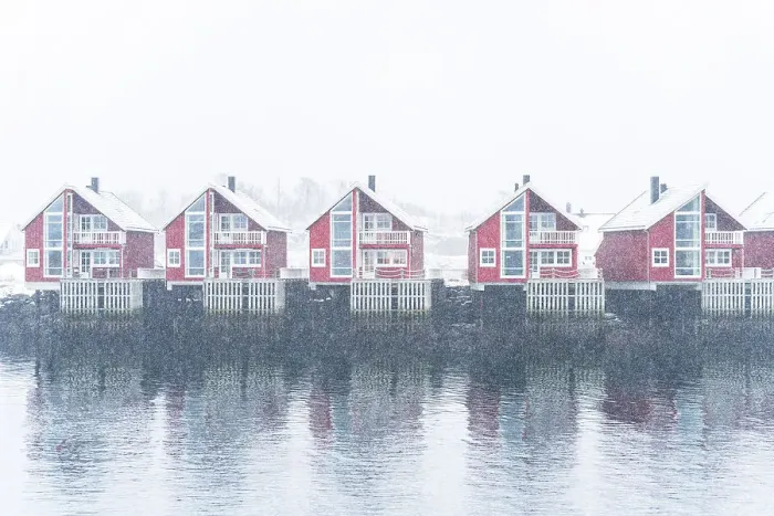 Framed Print : Row of traditional red rorbu under heavy snowfall, Svolvaer, Austvagsoya, Lofoten Islands, Norway, Scandinavia, Europe Framed Print : Row of traditional red rorbu under heavy snowfall, Svolvaer, Austvagsoya, Lofoten Islands, Norway, Scandinavia, Europe
