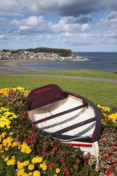 Rowing boat and flower display at South Cliff Gardens, Scarborough, North Yorkshire, Yorkshire, England, United Kingdom, Europe