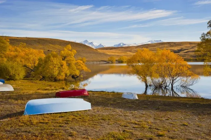 Framed Print : Rowing boats and snow capped mountains at Lake Alexandrina, Southern Lakes, Otago Region, South Island, New Zealand, Pacific Framed Print : Rowing boats and snow capped mountains at Lake Alexandrina, Southern Lakes, Otago Region, South Island, New Zealand, Pacific