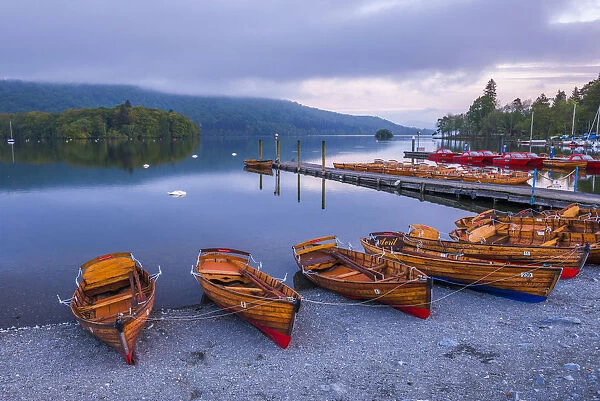 Rowing boats at Windermere at sunset, Lake District National Park, UNESCO World Heritage Site
