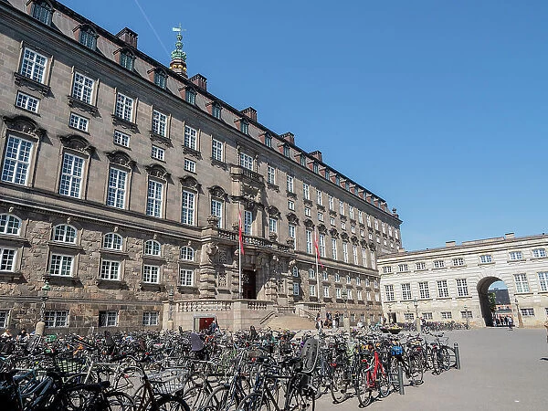 Rows of bicycles outside the Christiansborgs Palace, home of the Danish Parliament, Copenhagen, Denmark, Scandinavia, Europe