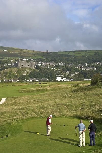 Royal St. Davids Golf Club and Harlech Castle in summer sunshine, Harlech, Gwynedd, Wales, United Kingdom, Europe