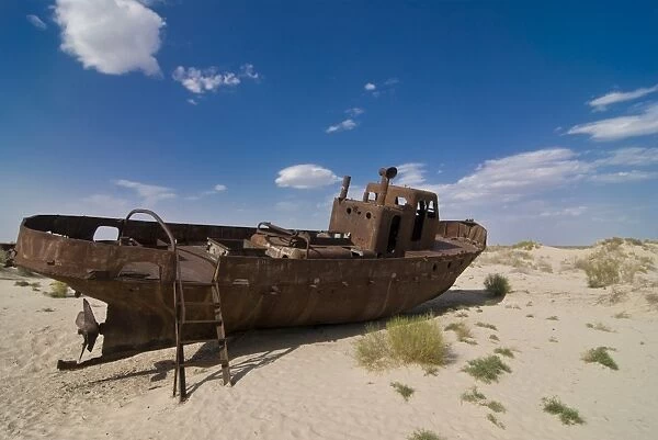Rusting boats lying in the desert which used to be the Aral Sea, Moynaq
