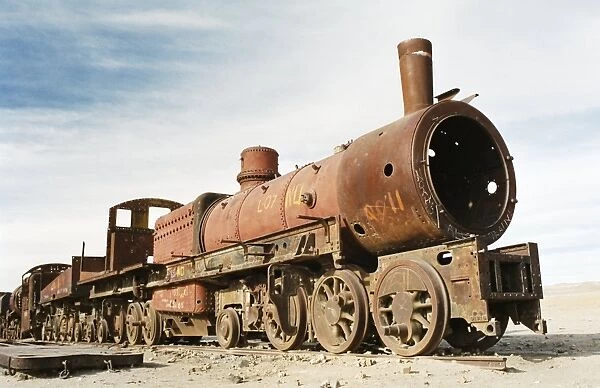 Rusting locomotive at train graveyard, Uyuni, Bolivia, South America