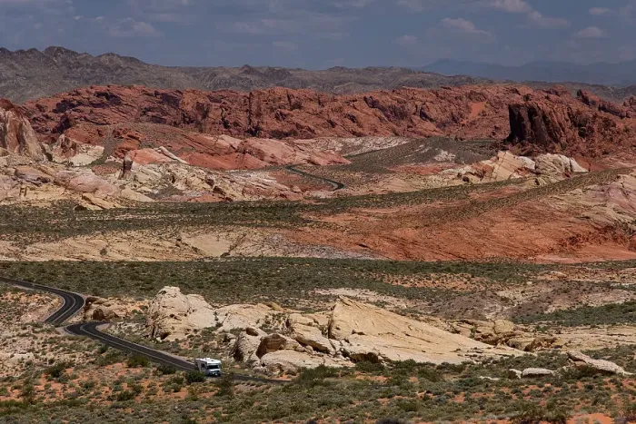 Framed Print : An RV Camper Van Recreational Vehicle travels the highway of White Domes Road through the Valley of Fire State Park, Nevada, United States of America, North America Framed Print : An RV Camper Van Recreational Vehicle travels the highway of White Domes Road through the Valley of Fire State Park, Nevada, United States of America, North America