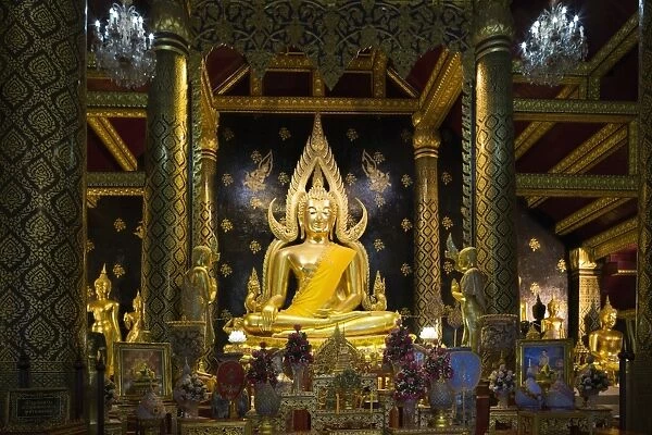 The sacred Phra Buddha Chinnarat Buddha in the temple of Wat Phra Si Rattana Mahathat