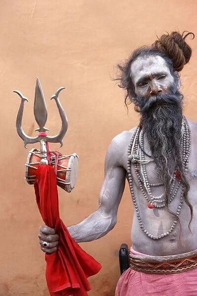 Sadhu with Shiva trident attending Haridwar Kumbh Mela, Haridwar, Uttarakhand, India