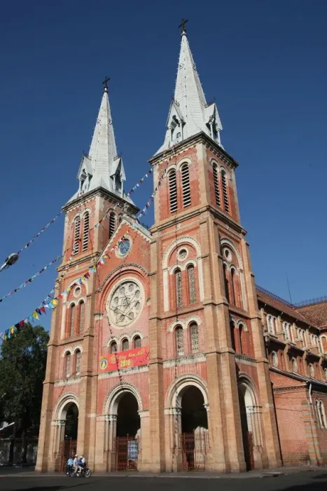 Framed Print : The Saigon Notre-Dame Basilica, a neo-Romanesque Catholic church built by the French in Framed Print : The Saigon Notre-Dame Basilica, a neo-Romanesque Catholic church built by the French in