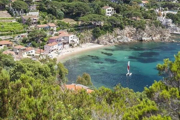 Sailboat in the turquoise sea, Porto Azzurro, Elba Island, Livorno Province, Tuscany