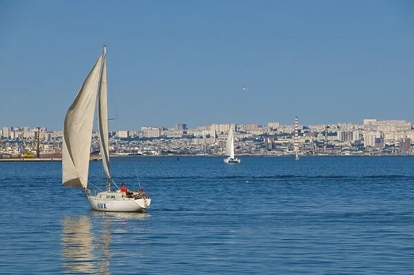 Sailing boat on Baku Bay, Baku, Azerbaijan, Central Asia, Asia