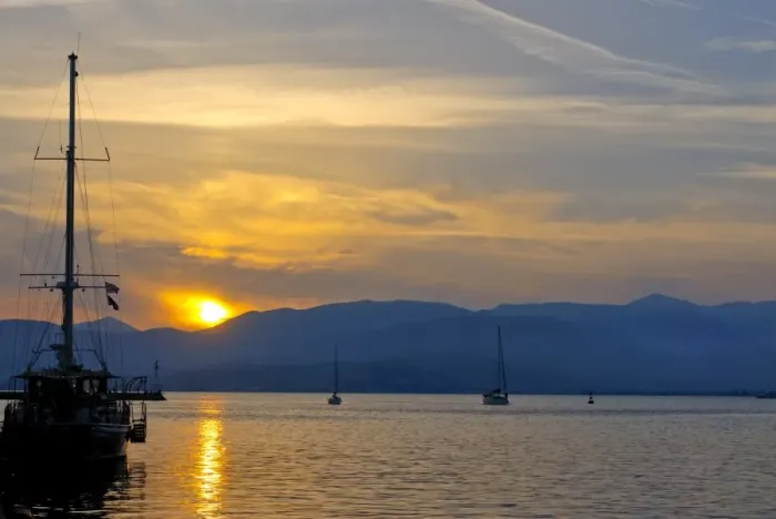 Framed Print : Sailing boat at sunset in the harbor of Nafplio, Peloponnese, Greece, Europe Framed Print : Sailing boat at sunset in the harbor of Nafplio, Peloponnese, Greece, Europe